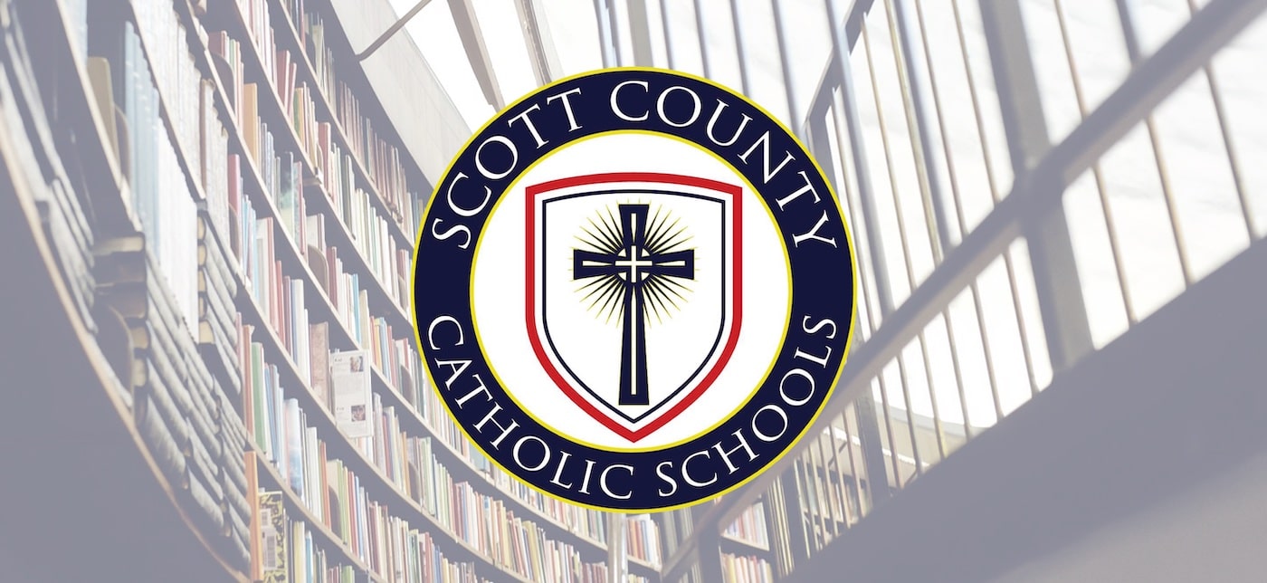 Scott County Catholic Schools seal with cross in a shield set on the background of a library with shelves of books