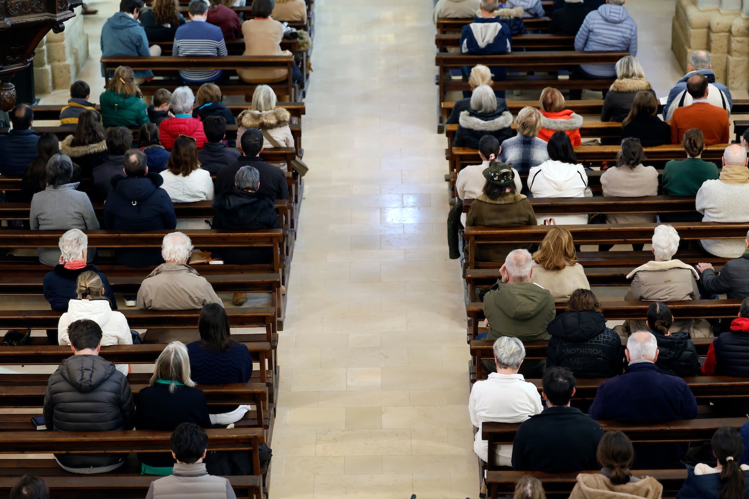 Mass in a roman catholic church. Church full of parishioners. Saint Jean Baptiste church.   Megeve.France.